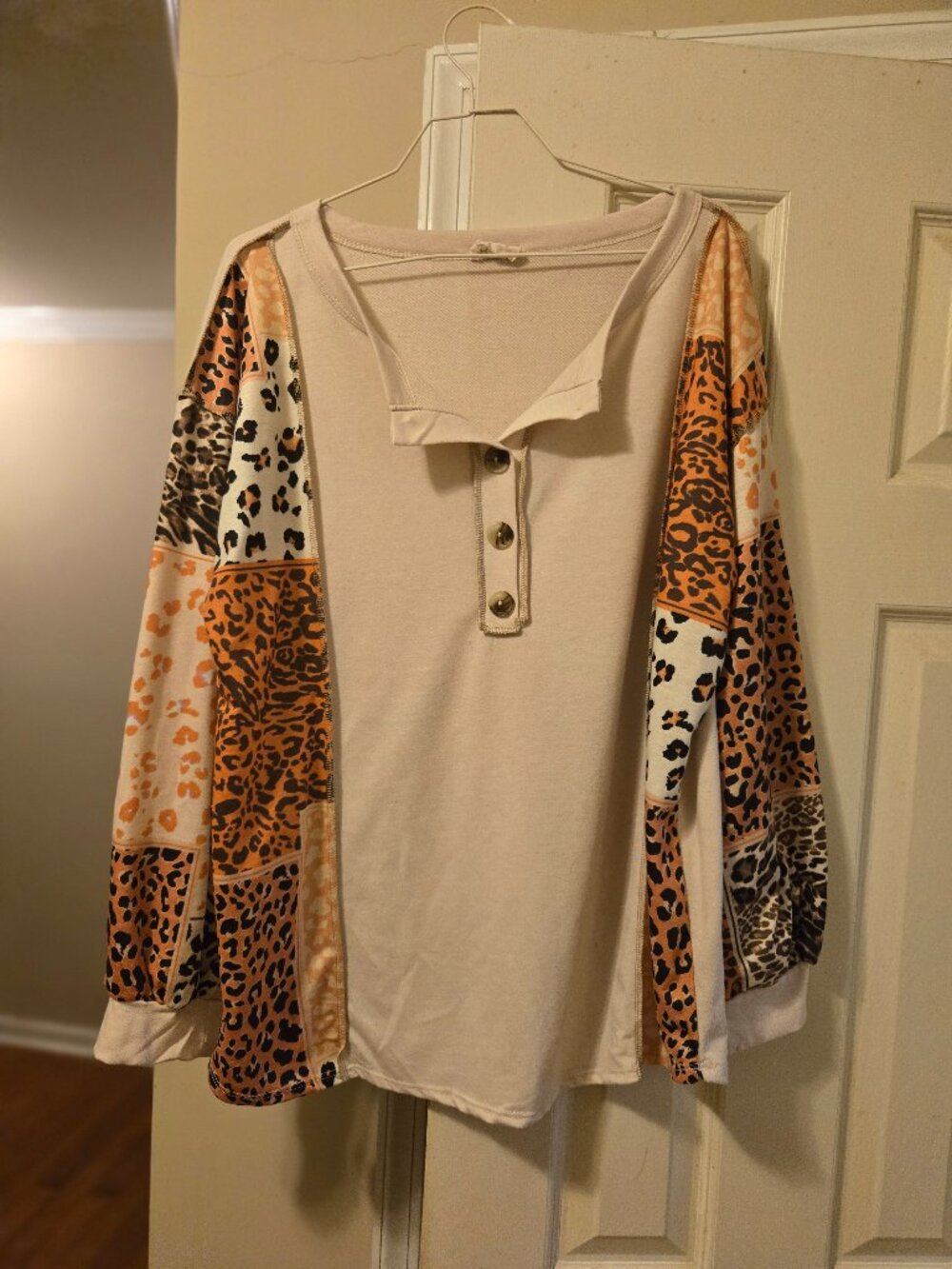 BiBi Cream Henley with Orange & Brown Leopard Patchwork Sleeves